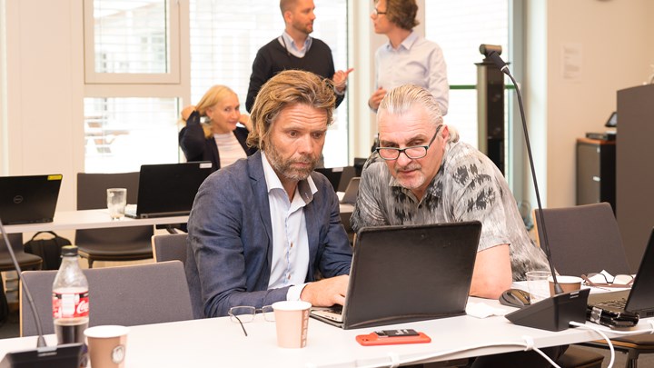 Ansattrepresentantene Christian Grimsgaard (t.v.) og Lasse Sølvberg stemte mot å starte gjennomføringen av utbyggingsprosjektene på Rikshospitalet og Aker. Her er de fotografert på et tidligere styremøte.